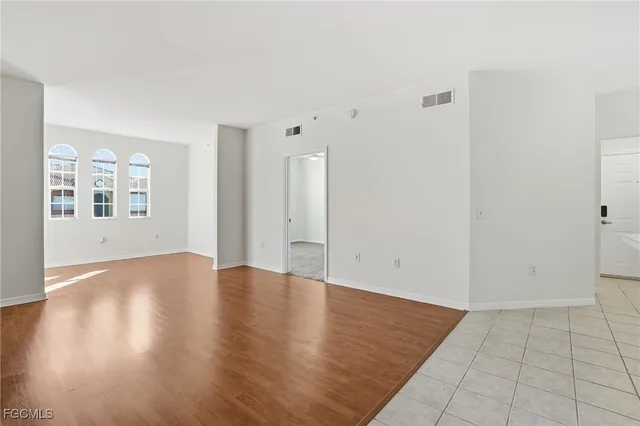 a view of a livingroom with wooden floor