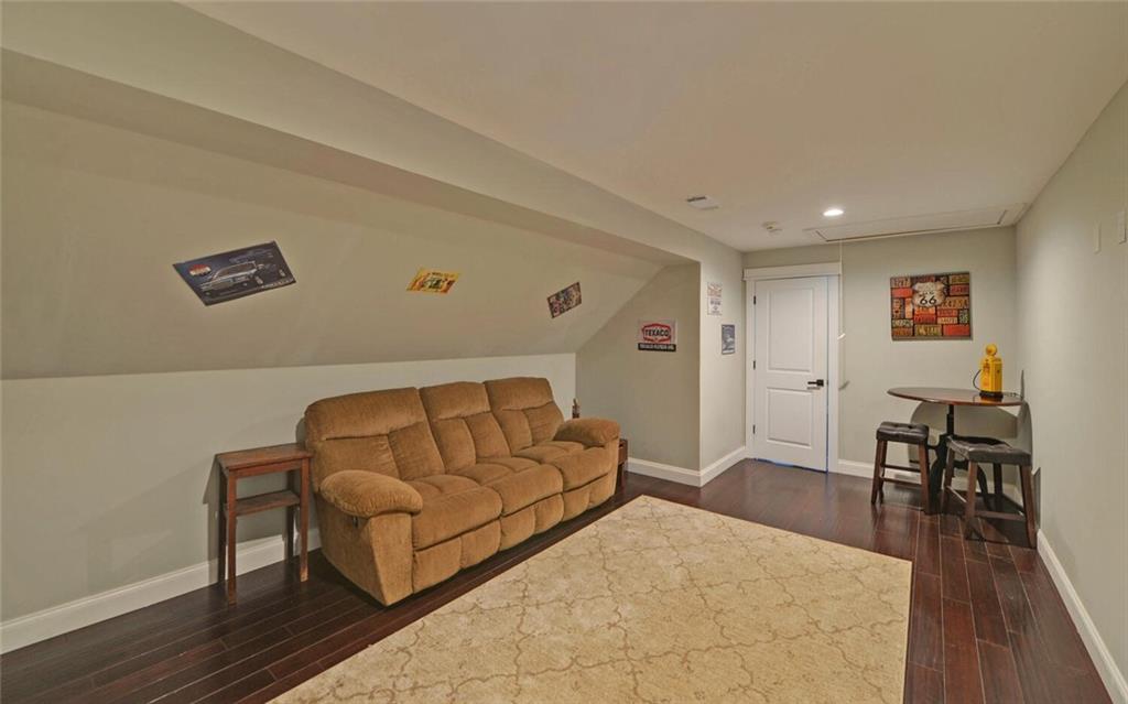 1330 Mc Cannon-Morris Road Colbert, GA 30628 - Photo 35 of 63 a living room with furniture and a wooden floor