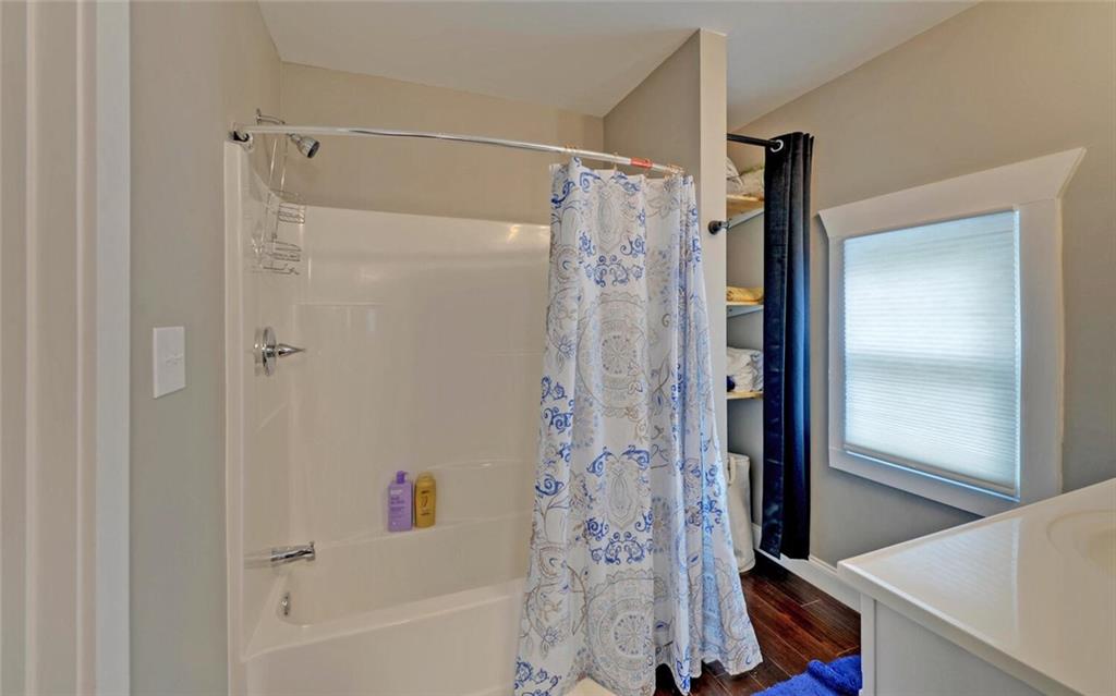 1330 Mc Cannon-Morris Road Colbert, GA 30628 - Photo 43 of 63 a bathroom with a shower and a tub