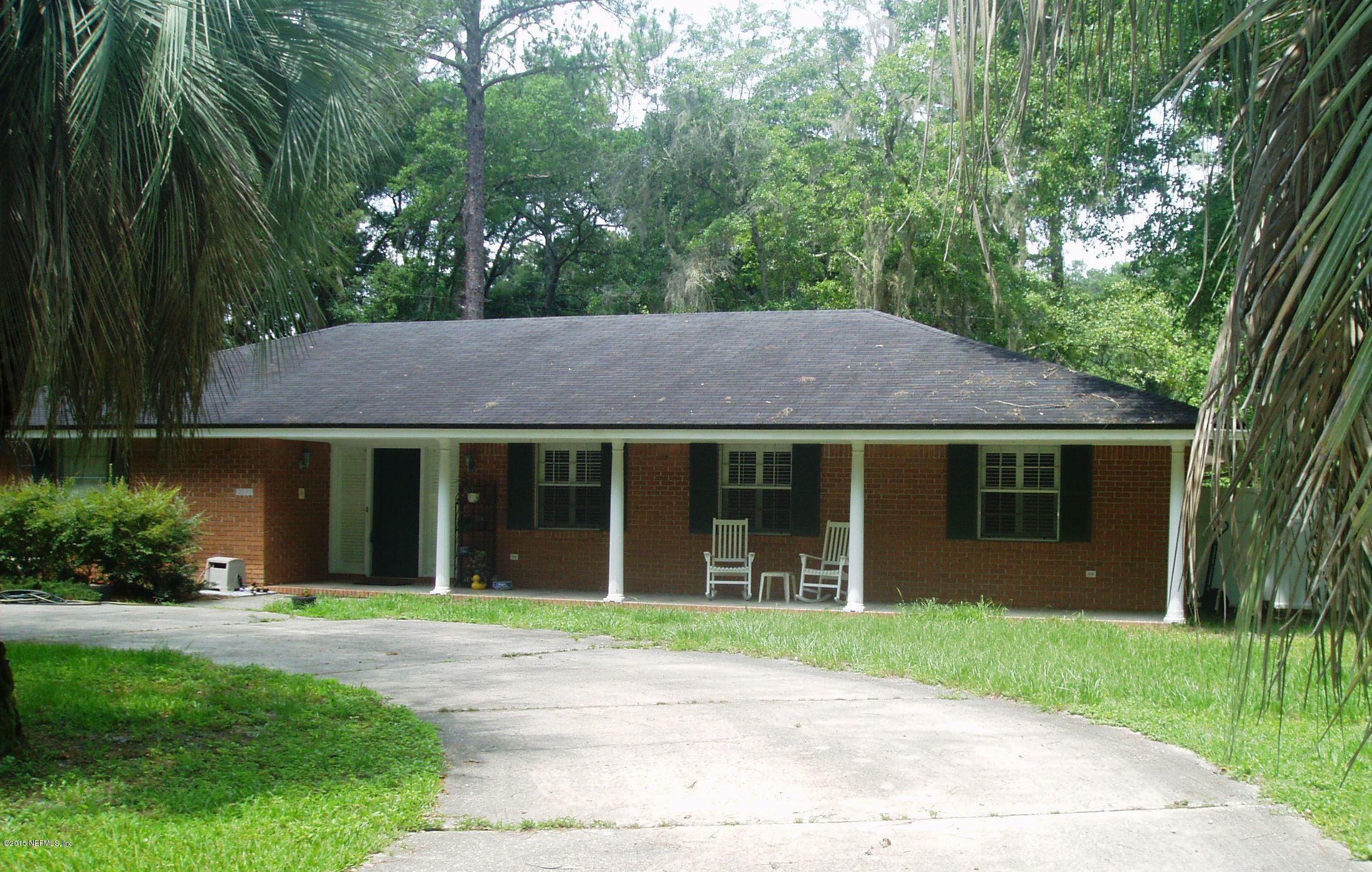 2633 Loretto Road Jacksonville, FL 32223 - Photo 2 of 2 front view of house with a yard