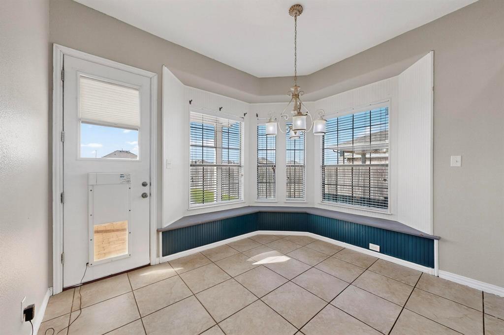 10309 Crowne Pointe Lane Fort Worth, TX 76244 - Photo 12 of 37 a view of an empty room with a window