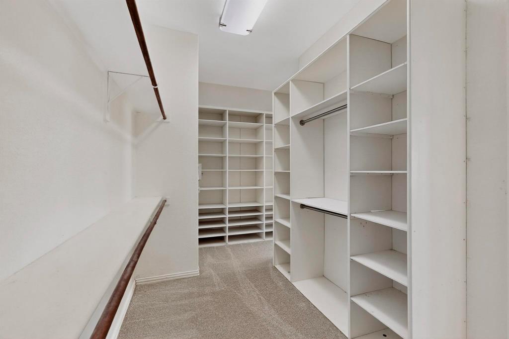 10309 Crowne Pointe Lane Fort Worth, TX 76244 - Photo 19 of 37 a view of walk in closet with empty racks