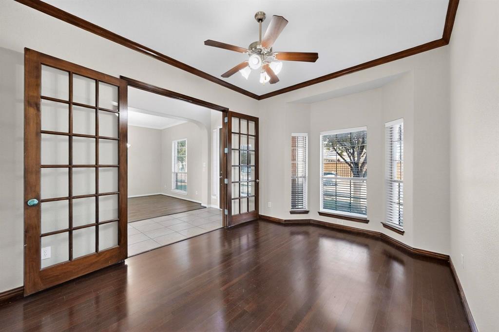 10309 Crowne Pointe Lane Fort Worth, TX 76244 - Photo 4 of 37 a view of an entryway with wooden floor