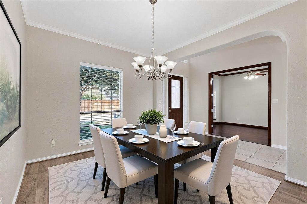10309 Crowne Pointe Lane Fort Worth, TX 76244 - Photo 5 of 37 a view of a dining room with furniture window and wooden floor