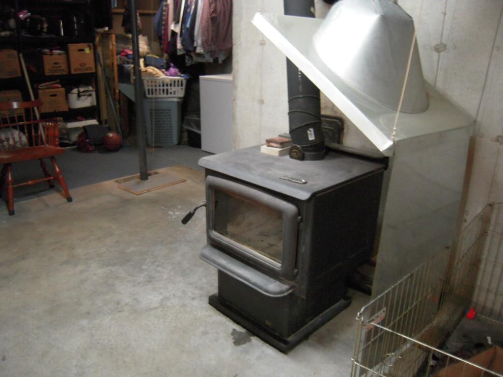 290 Stone Road West Newfield, ME 04095 - Photo 15 of 30 Wood Stove in the basement