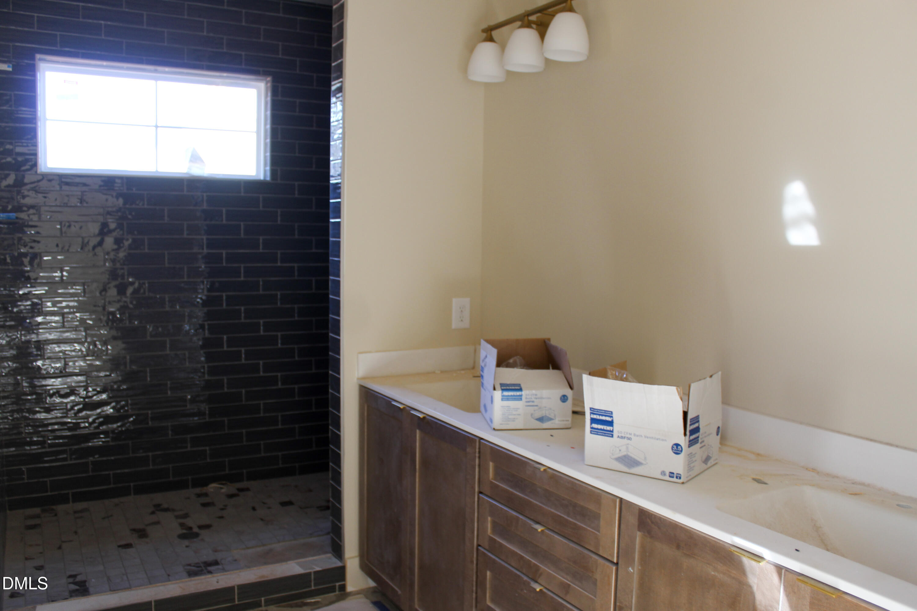 40 Stream Vw Way Spring Hope, NC 27882 - Photo 13 of 19 a bathroom with a sink and a mirror