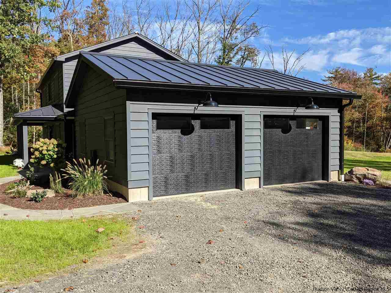 238 Chestnut Hill Road Stone Ridge, NY 12484 - Photo 34 of 35 a front view of a house with a yard