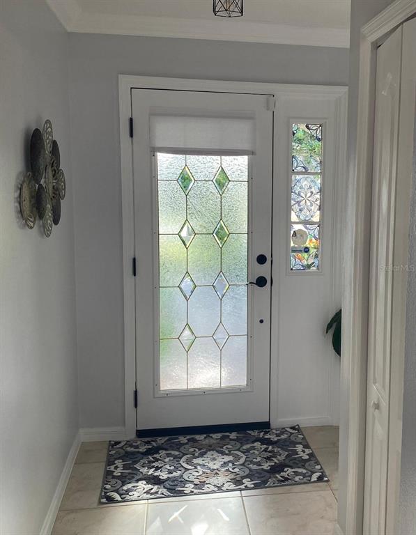 8437 Gibralter Street Spring Hill, FL 34608 - Photo 4 of 30 a view of a door in the house