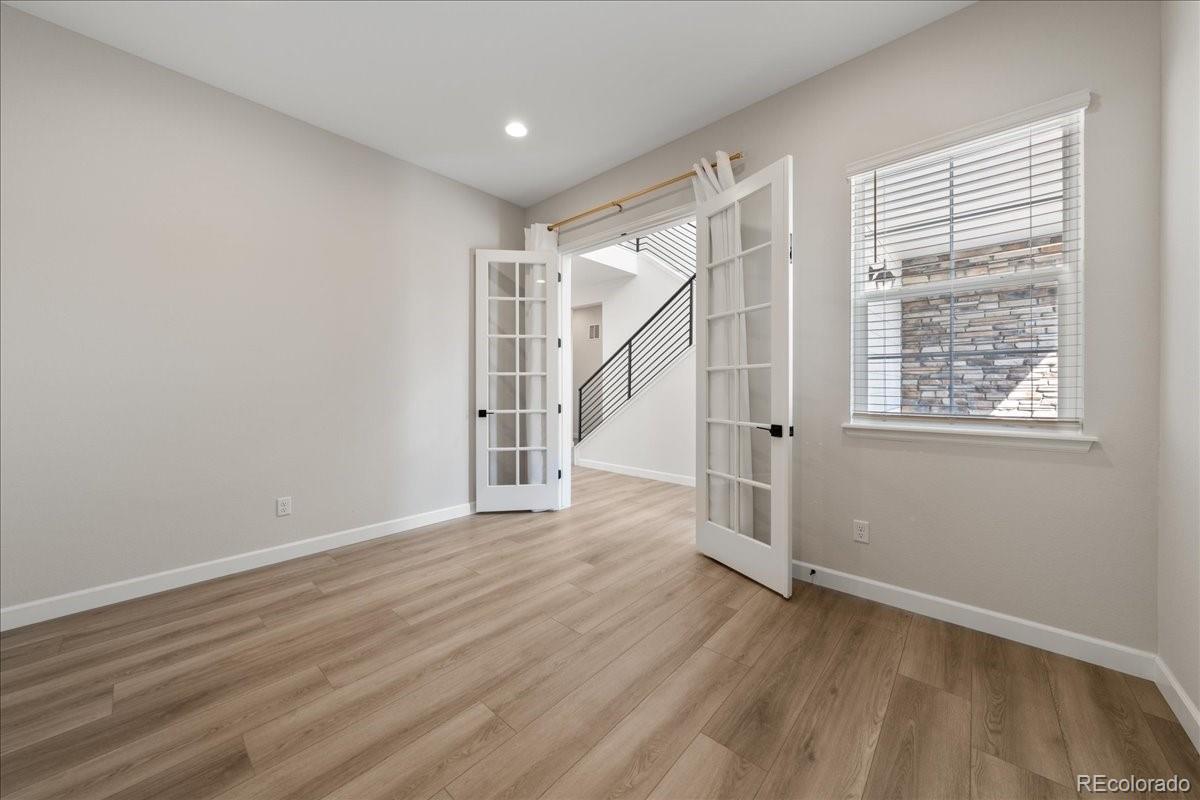 1335 Alyssa Drive Timnath, CO 80547 - Photo 13 of 50 a view of entryway with wooden floor