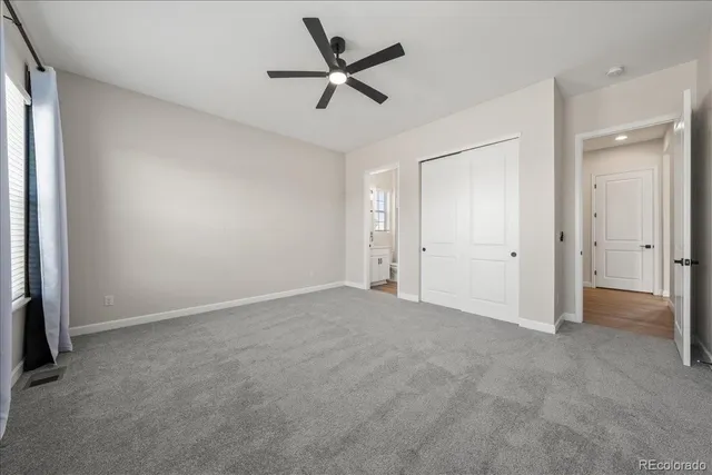a bathroom with a sink toilet a mirror and shower