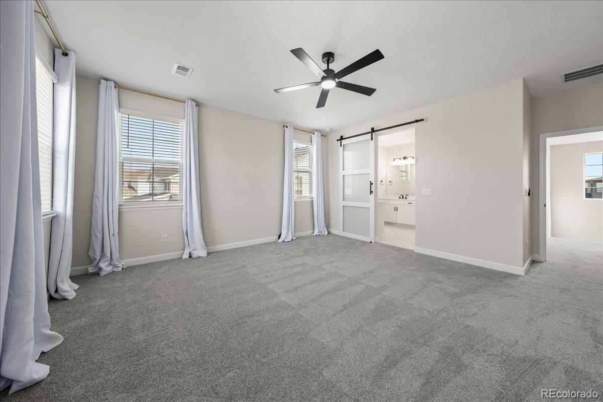 1335 Alyssa Drive Timnath, CO 80547 - Photo 20 of 50 a view of an empty room with a window