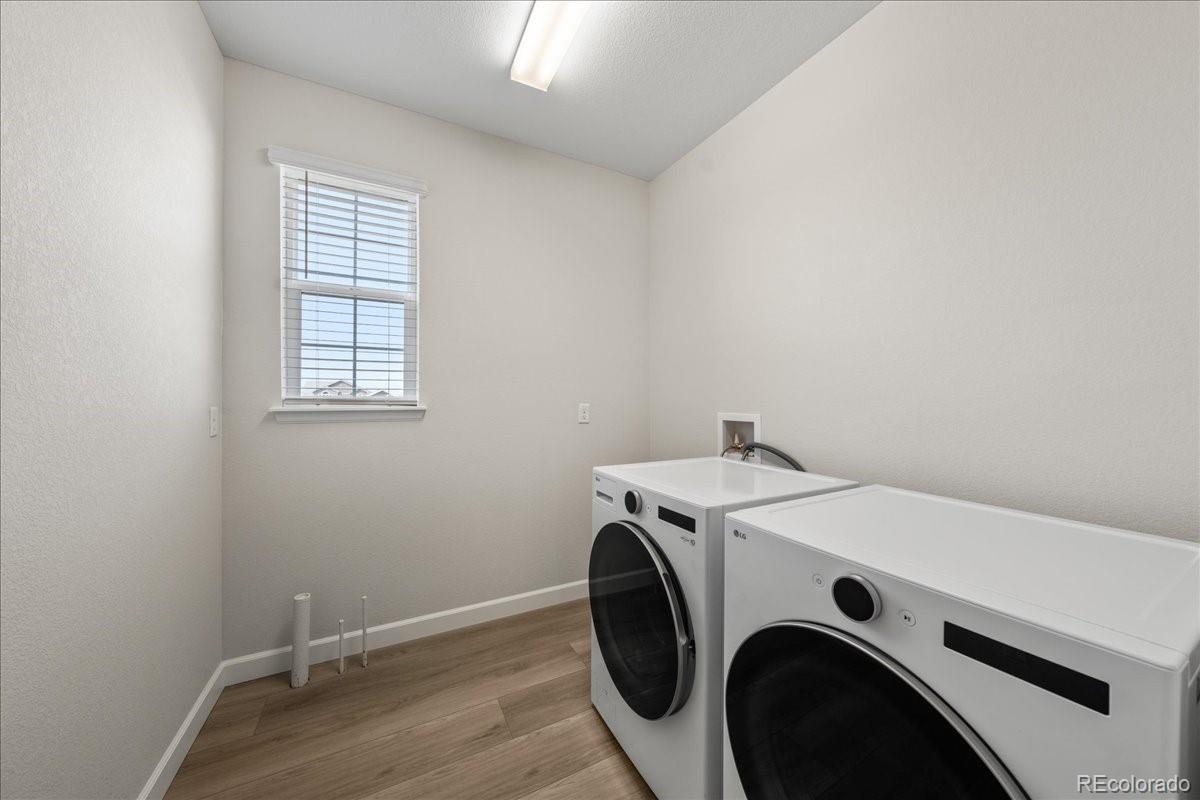 1335 Alyssa Drive Timnath, CO 80547 - Photo 26 of 50 a utility room with dryer and washer