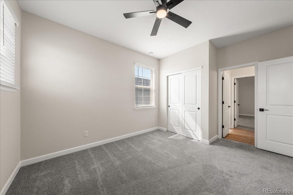 1335 Alyssa Drive Timnath, CO 80547 - Photo 29 of 50 a view of an empty room with a window