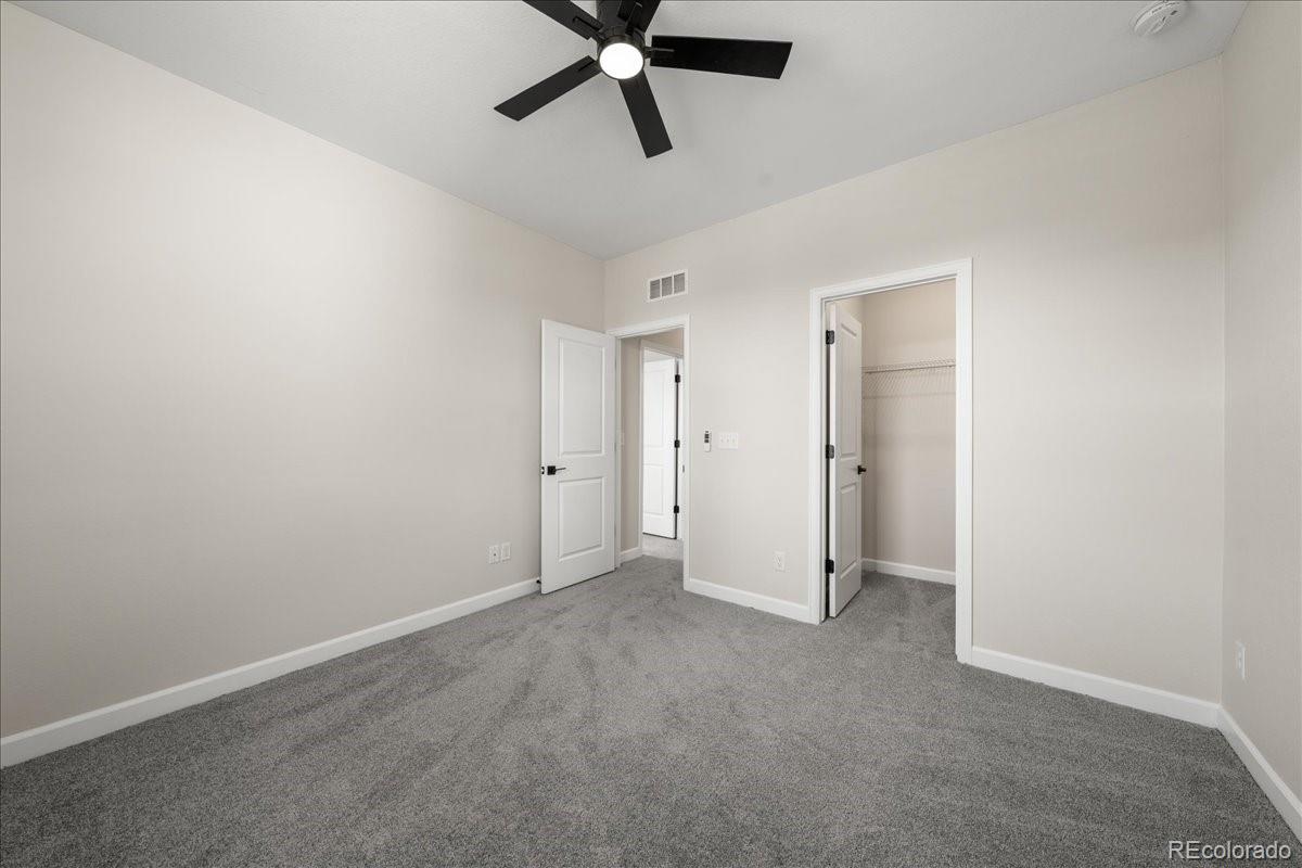 1335 Alyssa Drive Timnath, CO 80547 - Photo 32 of 50 an empty room with closet and windows