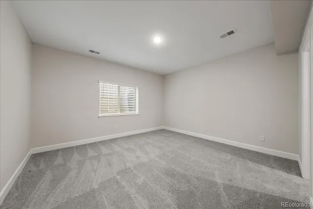 an empty room with an entryway