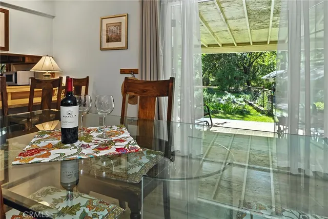 a room with water heater and wooden floor