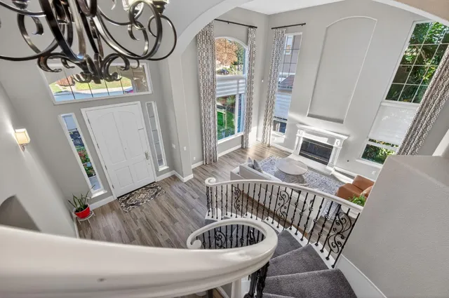 a view of a door and chair in the balcony
