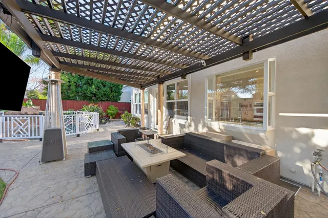 a potted plant sitting in front of a house