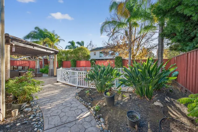 a balcony with view of swimming pool