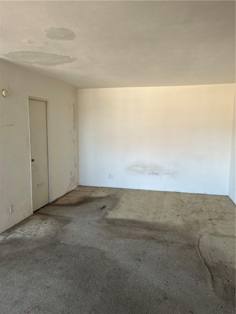 1020 Grand Concourse, Unit 8H Bronx, NY 10451 - Photo 2 of 13 Spare room featuring carpet flooring