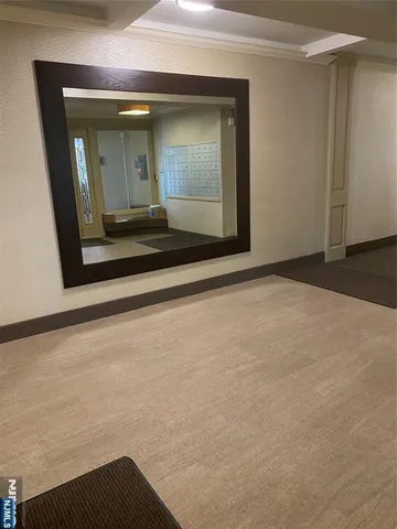 a view of wooden floor and a cabinet