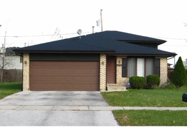 $165,000 | 920 East 153rd Street, Harvey, IL 60426