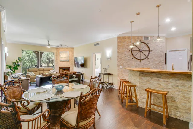 a kitchen with stainless steel appliances granite countertop a sink and cabinets