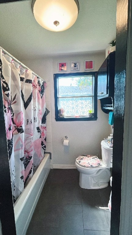 319 Walnut Avenue Winnie, TX 77665 - Photo 13 of 19 a bathroom with a toilet sink and mirror