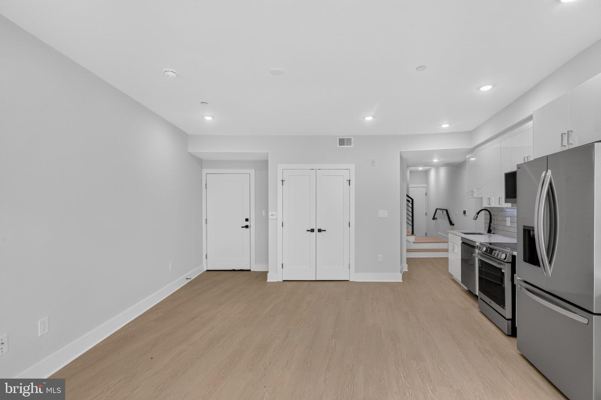 1650 Columbia Road Northwest, Unit 402 Washington, DC 20009 - Photo 6 of 19 Modern open space with sleek design.