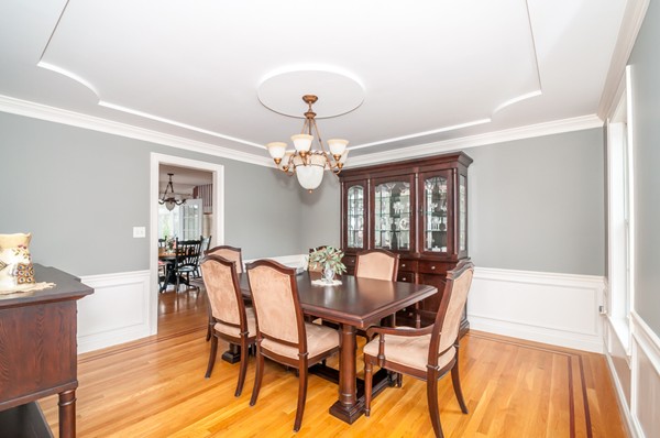 100 Eastgate Road Tewksbury, MA 01876 - Photo 2 of 30 a dining room with furniture and window