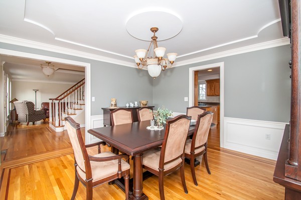 100 Eastgate Road Tewksbury, MA 01876 - Photo 3 of 30 a view of a dining room with furniture and wooden floor