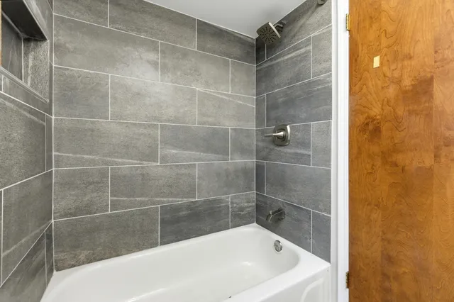 a bathroom with a bathtub