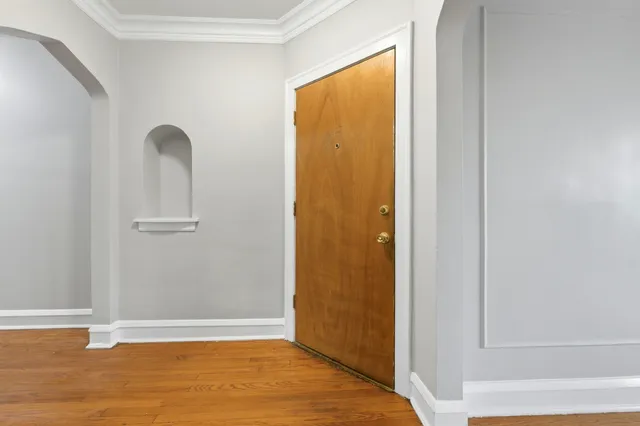 a view of room with window and hallway