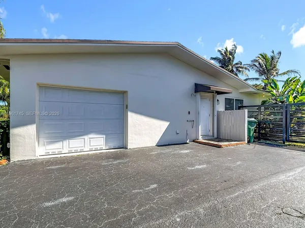 a view of a house with a garage