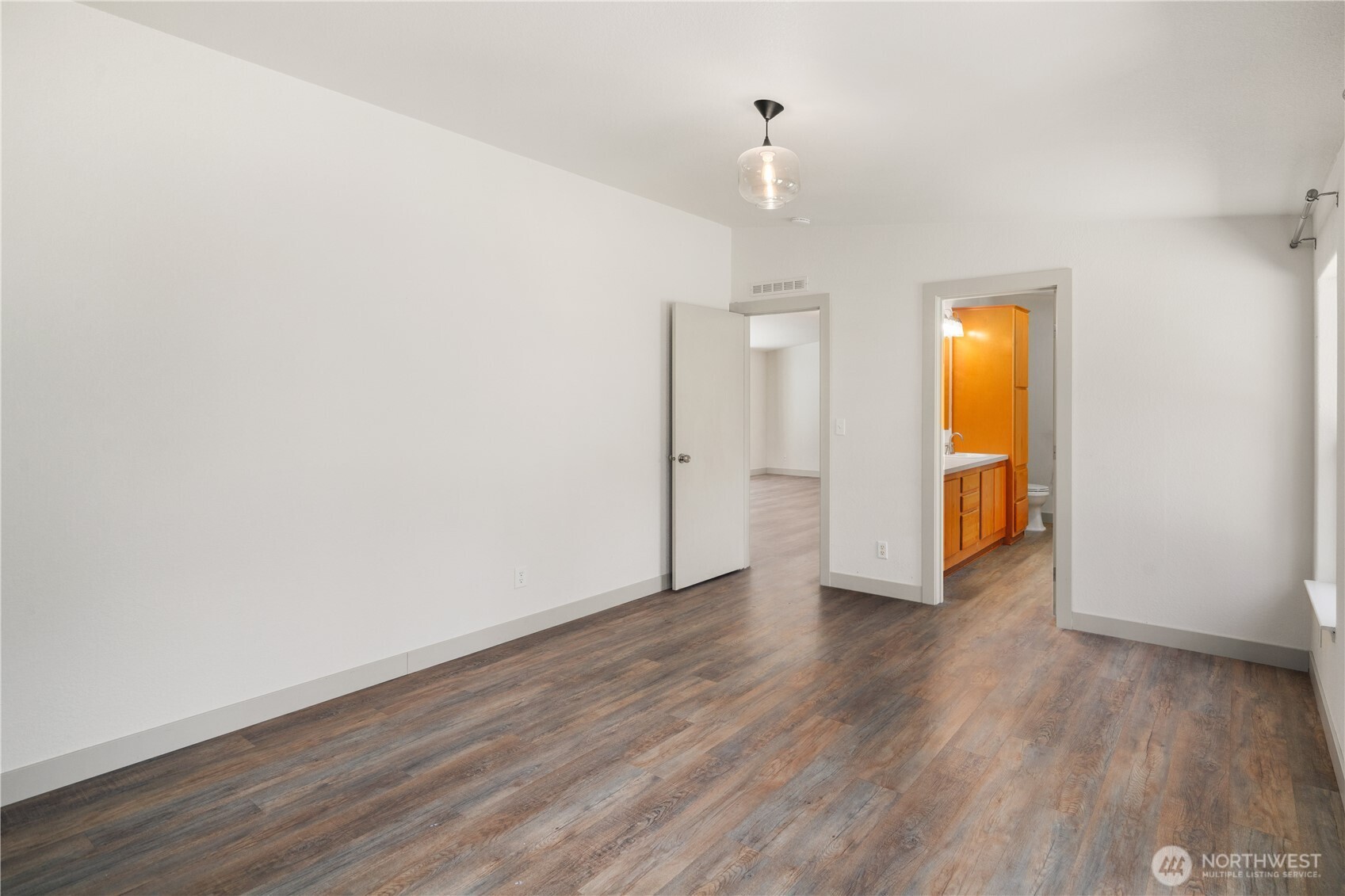 408 South Saylor Road Camano Island, WA 98282 - Photo 14 of 38 a view of empty room with wooden floor