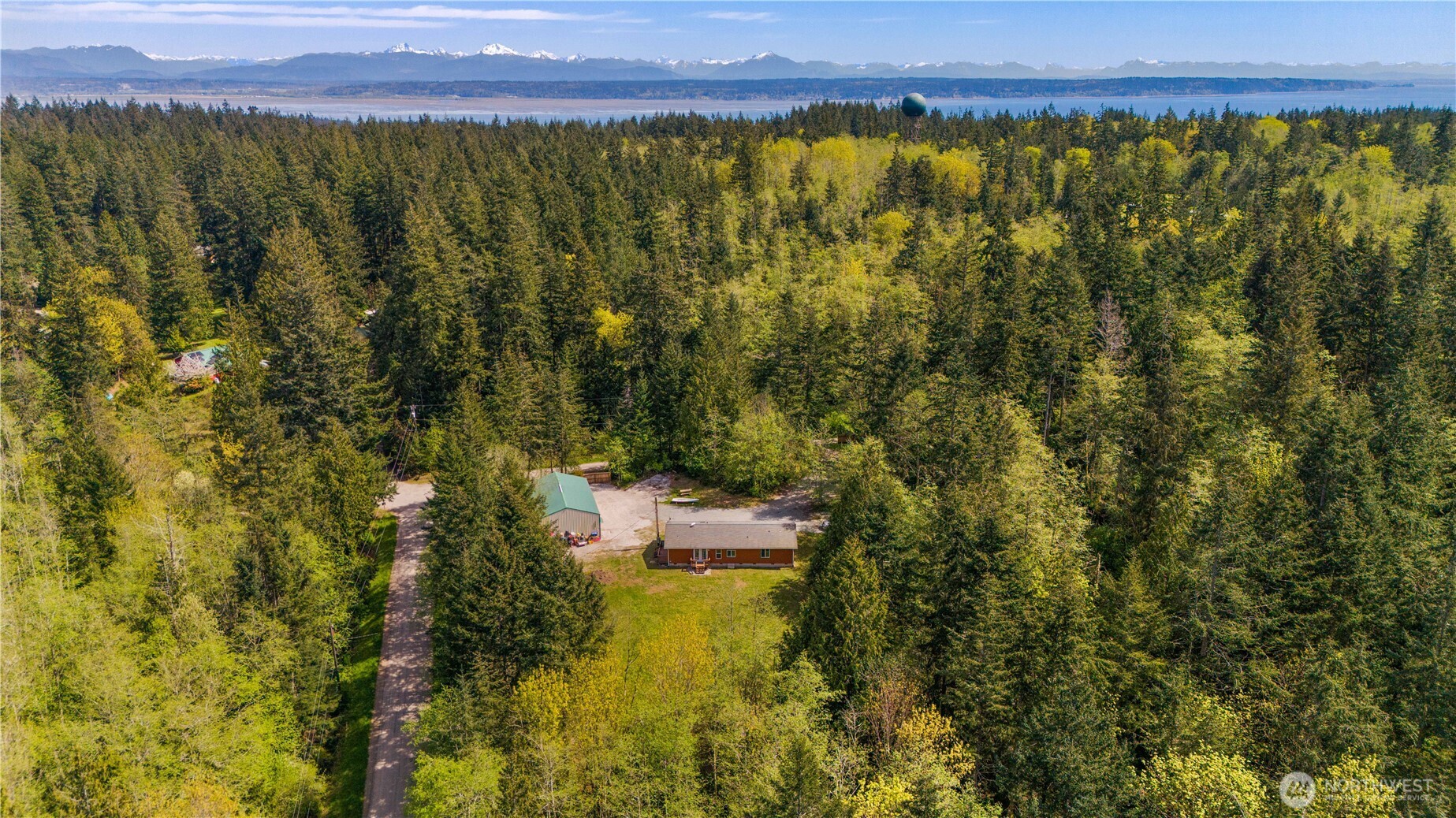 408 South Saylor Road Camano Island, WA 98282 - Photo 32 of 38 a view of a pool and a yard