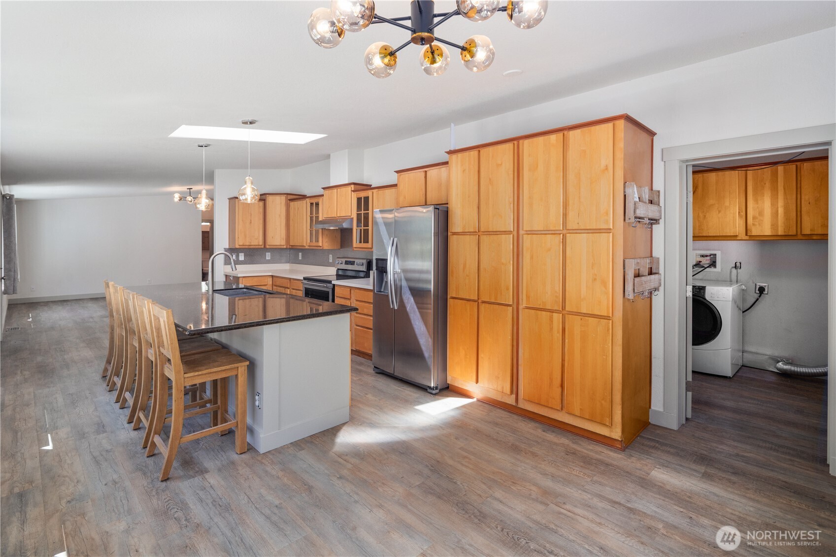 408 South Saylor Road Camano Island, WA 98282 - Photo 10 of 38 a living room with stainless steel appliances furniture and a large window
