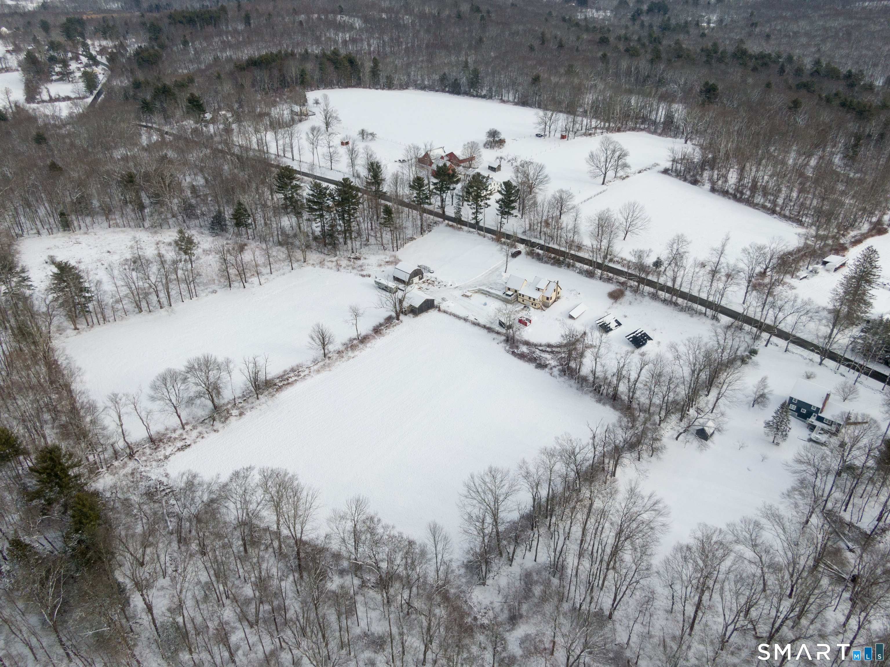 145 Perrin Road Woodstock, CT 06281 - Photo 19 of 33 a view of snow on side of road