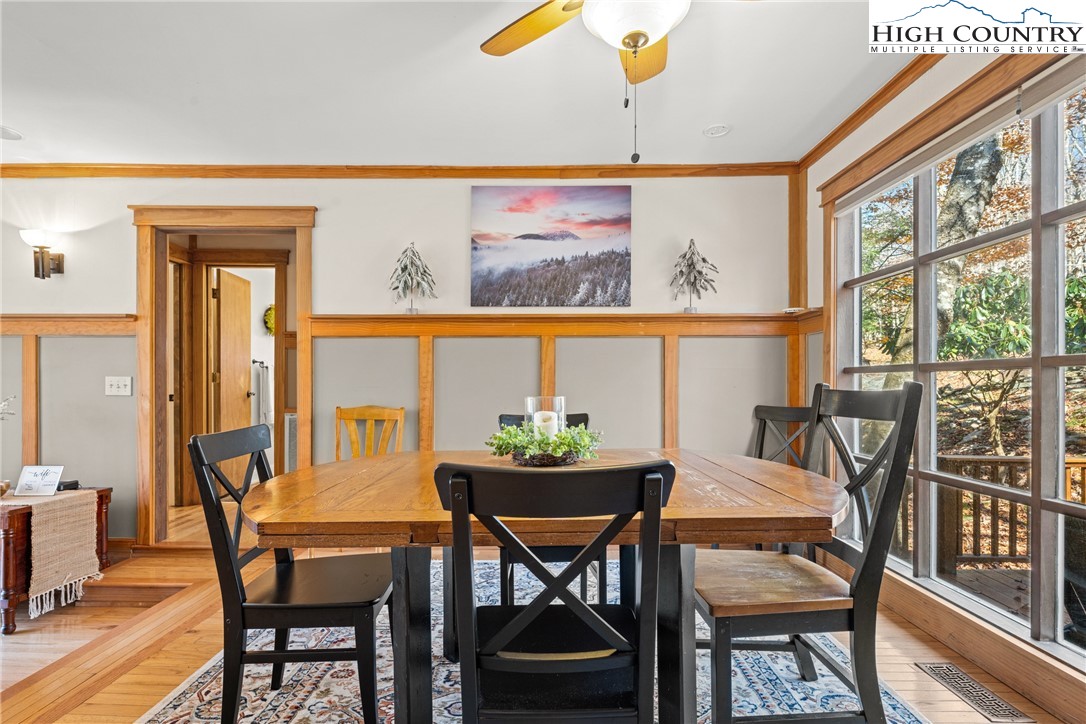 169 Hornbeam Road Beech Mountain, NC 28604 - Photo 12 of 48 a view of a dining room with furniture window and outside view
