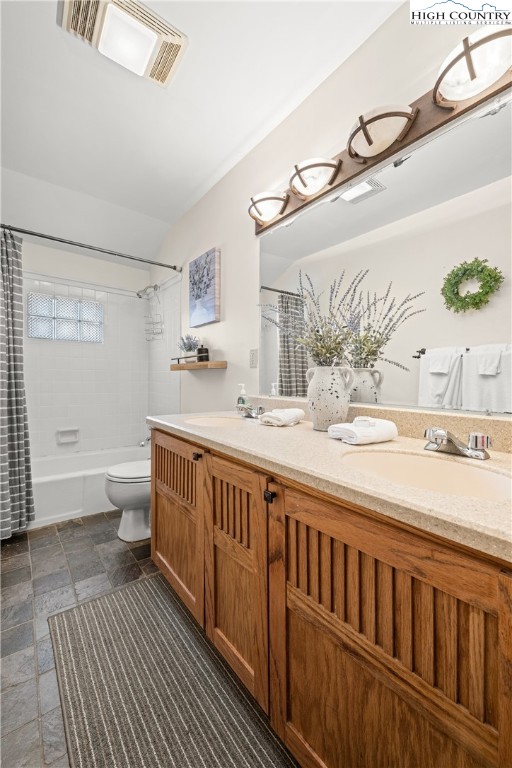 169 Hornbeam Road Beech Mountain, NC 28604 - Photo 23 of 48 a bathroom with a sink a toilet and shower