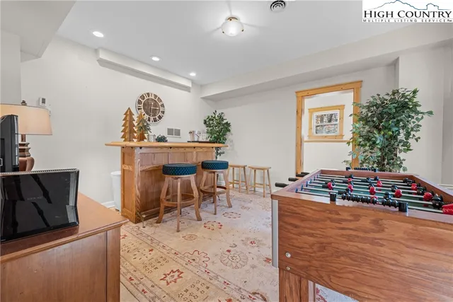 a living room with furniture and a couch