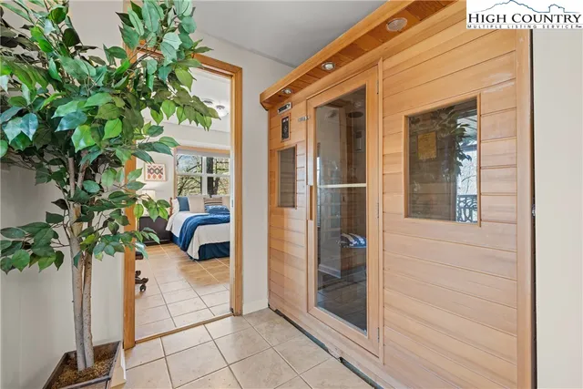 a potted plant sitting in front of a door