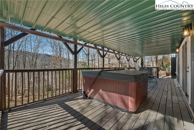 a view of outdoor space with wooden floor