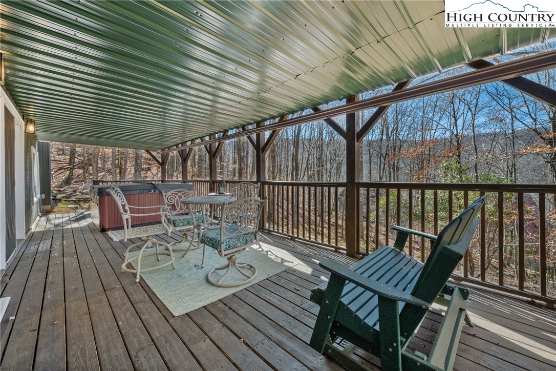 169 Hornbeam Road Beech Mountain, NC 28604 - Photo 39 of 48 a view of a chairs on the roof deck
