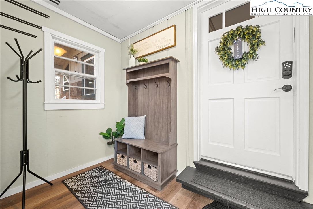 169 Hornbeam Road Beech Mountain, NC 28604 - Photo 4 of 48 a living room with furniture and a window