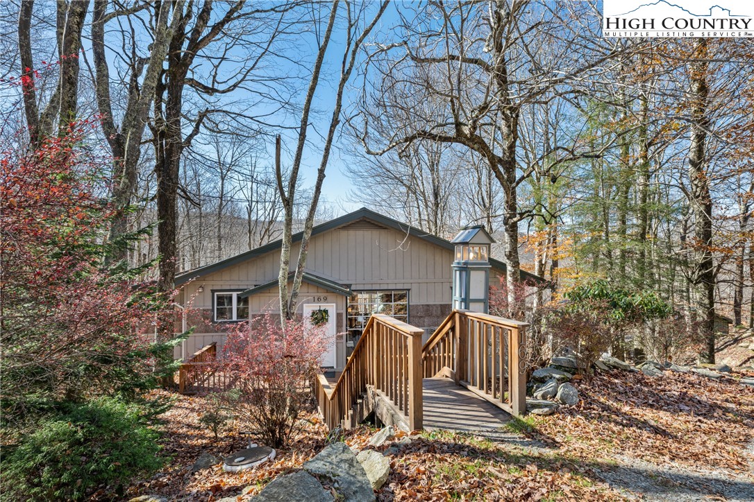 169 Hornbeam Road Beech Mountain, NC 28604 - Photo 48 of 48 a front view of a house with garden