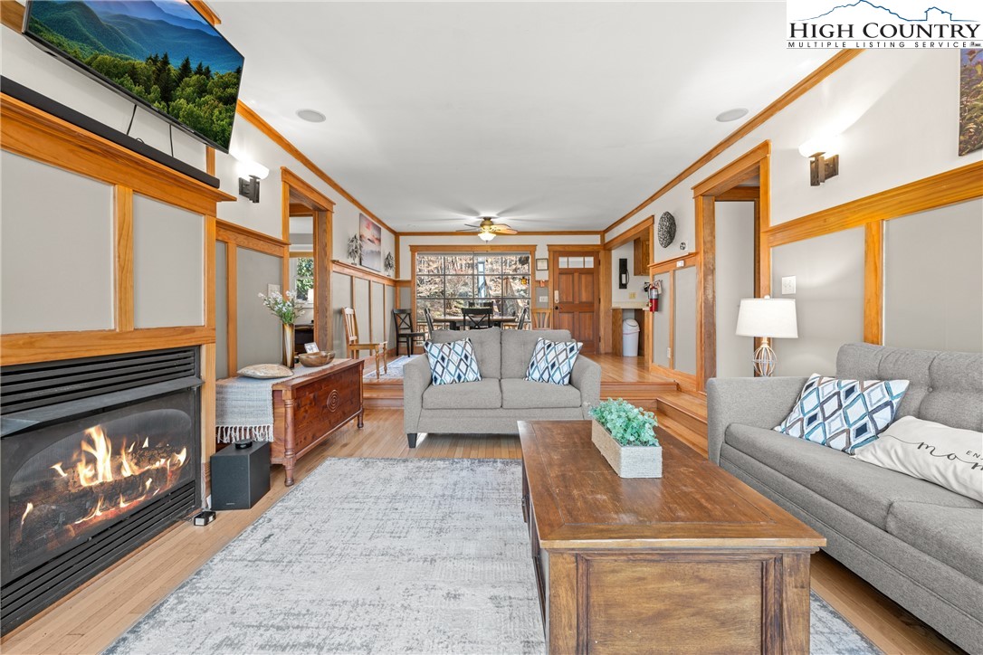 169 Hornbeam Road Beech Mountain, NC 28604 - Photo 9 of 48 a living room with furniture and a fireplace