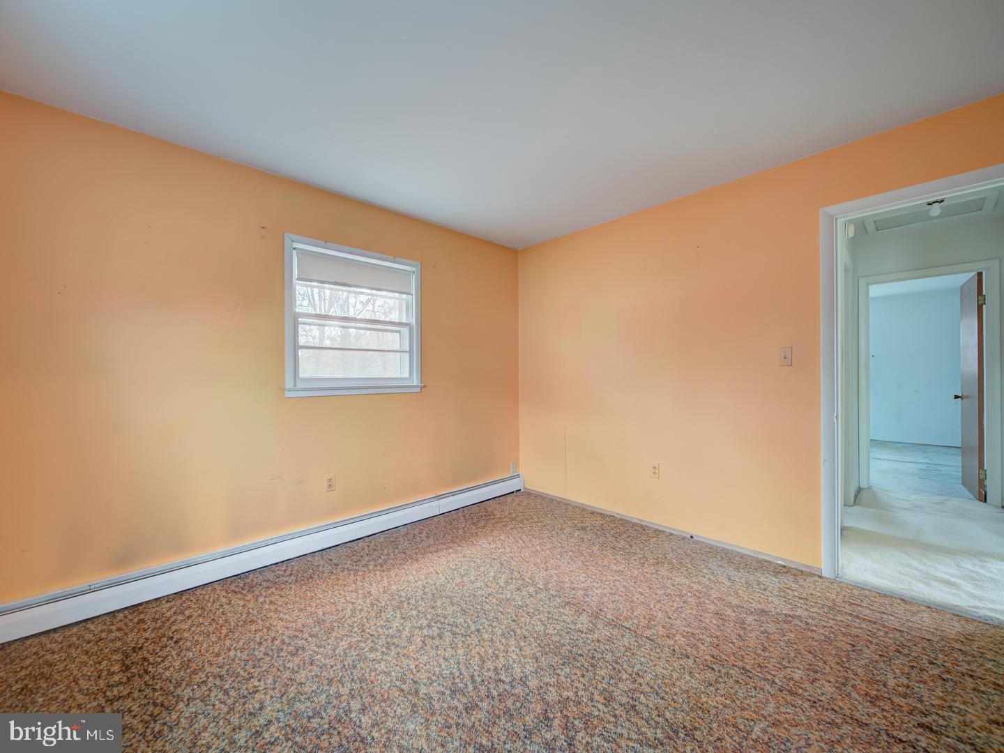 15140 Georgia Road Woodbridge, VA 22191 - Photo 15 of 37 an empty room with a window