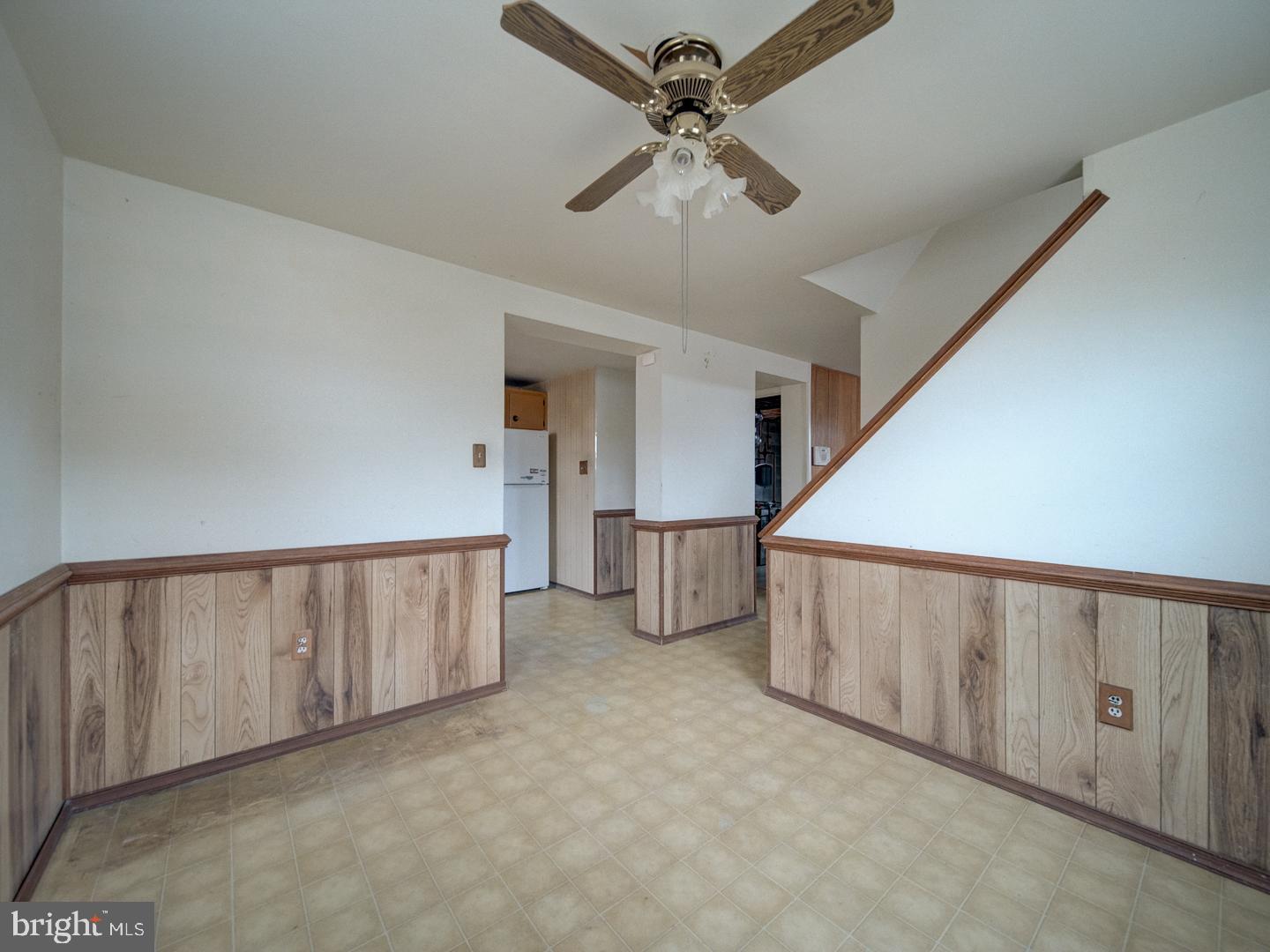 15140 Georgia Road Woodbridge, VA 22191 - Photo 25 of 37 a view of an empty room with stairs