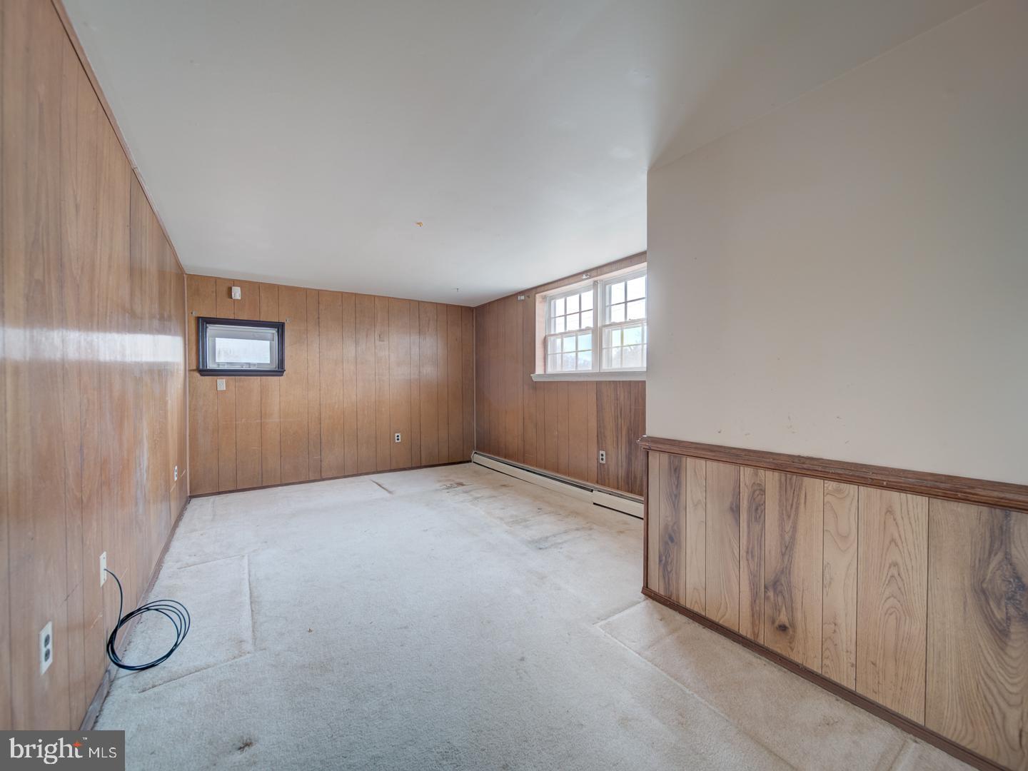 15140 Georgia Road Woodbridge, VA 22191 - Photo 31 of 37 an empty room with windows